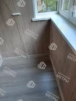 Отделка балкона под ключ ламинатом и натяжным потолком Отделка балкона под ключ ламинатом и натяжным потолком