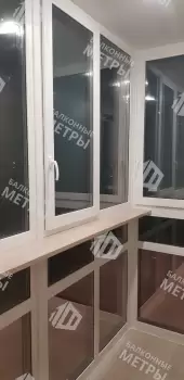 Панорамное остекление с тонировкой и отделка балкона Панорамное остекление с тонировкой и отделка балкона